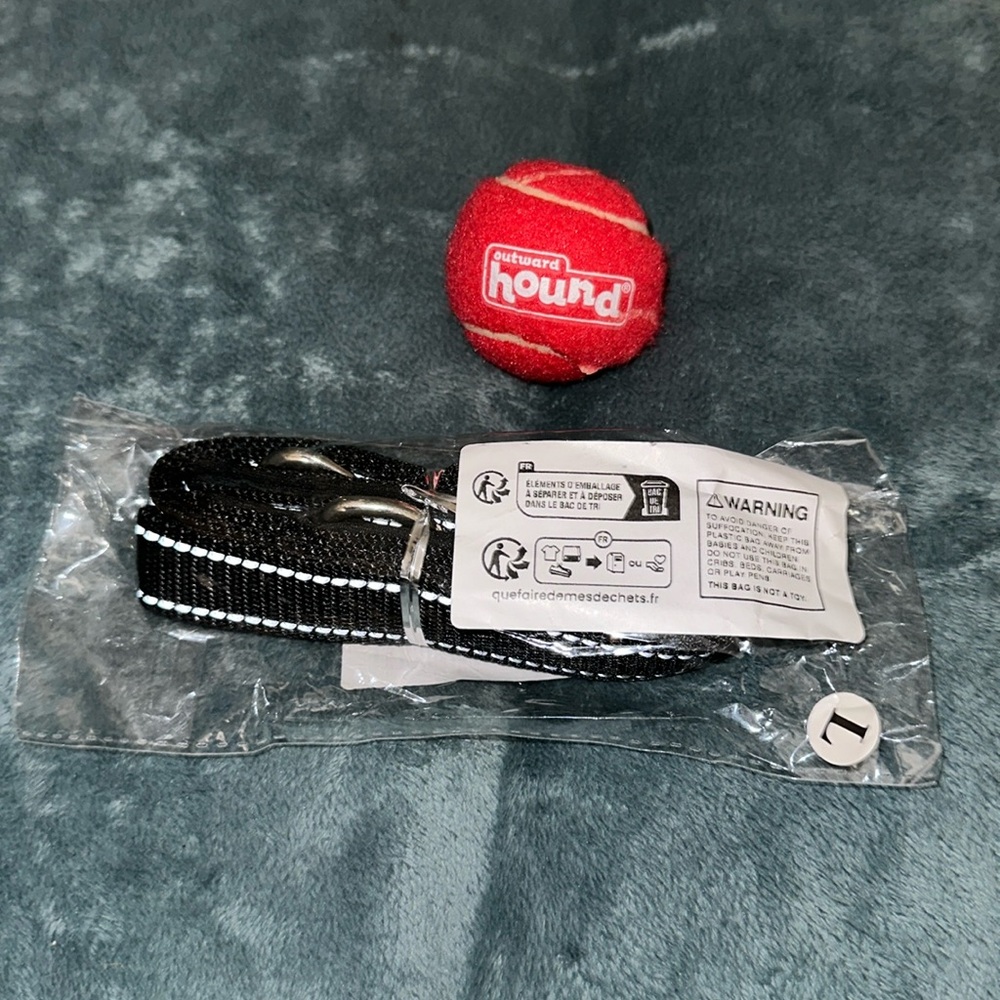 Large black dog leash with reflective stripes silver hardware and dog toy ball
